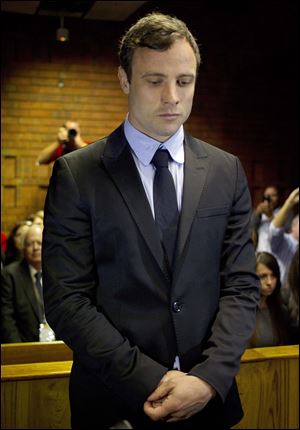 Oscar Pistorius appears at a court in Pretoria, South Africa, today.