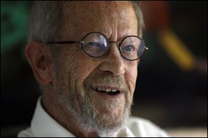 Author Elmore Leonard smiles during an interview at his home in Bloomfield Township, Mich., in August, 2012.