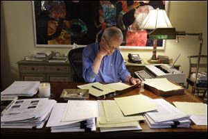 Elmore Leonard works on a manuscript at his home in 2010.