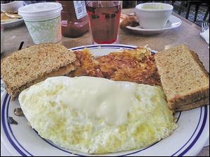 Smothered chicken omelet.