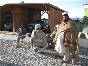 Author Vanessa Gezari interviews elders in Zormat, Afghanistan.