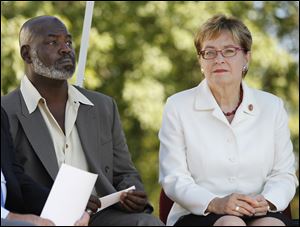 Toledo Mayor Mike Bell sits next to U.S. Rep. Marcy Kaptur (D., Toledo) during a news conference at a construction site on Machen Street in Toledo  where project Sponsors NeighborWorks Toledo Region and Mercy St. Vincent Medical Center announced the commencement of construction of the Legacy Homes project.