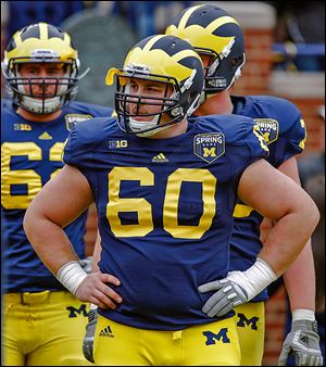  University of Michigan center Jack Miller is competing for the starting center on an offensive line that graduated three players.
