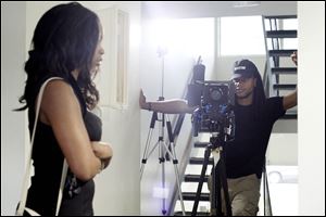Screenwriter and director Melvin Claybrooks, right, shoots a scene with actor Joslynn Smallwood while filming a short film titled ‘Innerview.’