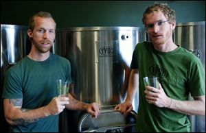 Young Veterans Brewing Co. President Thomas Wilder, left,  and co-founder Neil McCanon spent six years attempting to open their own brewery. The Iraq War veterans will open one next month in Virginia Beach, Va.