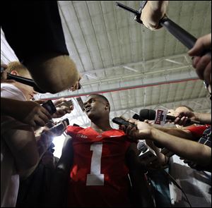 Ohio State Buckeyes running back Dontre Wilson (1) speaks to the media during Ohio State Football media day at the Woody Hayes Athletic Center in Columbus.