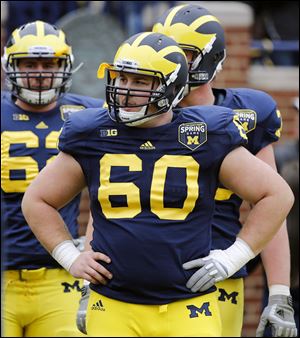 University of Michigan center Jack Miller (60) during the  spring scrimmage in Ann Arbor.