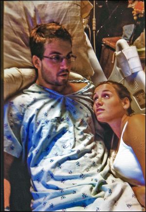 Paul Fudacz, Jr., and his sister Sarah after the bungled transplant surgery at the University of Toledo Medical Center last year. 