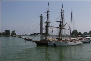 A reconstruction of the warship US Brig Niagara, left, and the Halie & Matthew, named for the children of its builder, Capt. George ‘Butch’ Harris, of Eastport, Maine, arrived Thursday at Put-in-Bay, Ohio, in anticipation of Monday’s re-enactment of the decisive War of 1812 battle in Lake Erie.