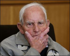 Siert Bruins , 92-year-old former member of the Nazi  Waffen SS, sits in the courtroom of the court in Hagen, Germany, Monday.`