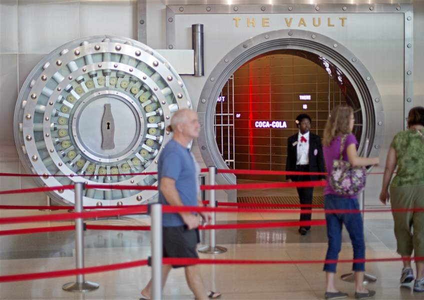 Tourists-pass-the-vault-exhibit