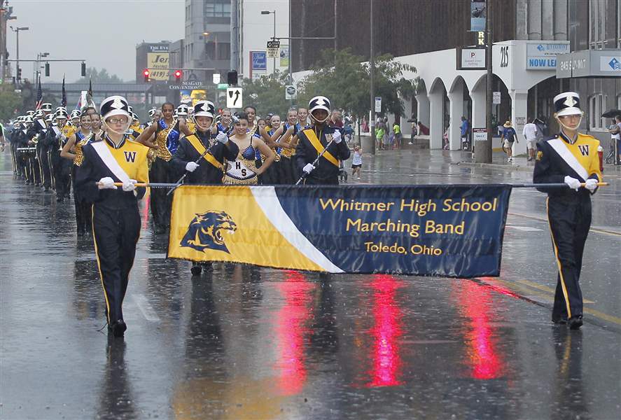 The-Whitmer-High-School-band-marches-thr