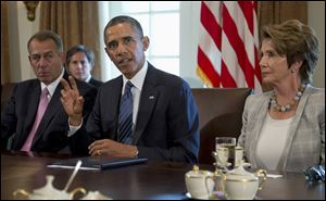 President Obama, flanked by House Speaker John Boehner of Ohio, left, and House Minority Leader Nancy Pelosi of Calif.,  speaks to media in the Cabinet Room of the White House in Washington before a meeting with members of Congress to discuss the situation in Syria.