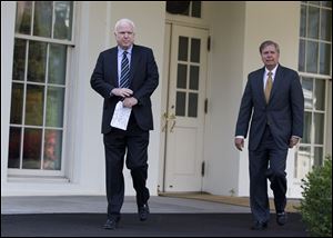 Sen. John McCain, R-Ariz., left, and Sen. Lindsey Graham, R-S.C., leave the White House in Washington, Monday following a closed-door meeting with President Obama to discuss the situation with Syria. 
