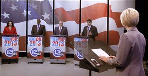Mayoral candidates Anita Lopez, Mayor Mike Bell, D. Michael Collins and Joe McNamara during debate at Channel 13 ABC News in Toledo, Ohio. Moderator is Diane Larson.