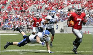 Ohio State halfback Jordan Hall (7) scores a touchdown  against  Buffalo during the second quarter.