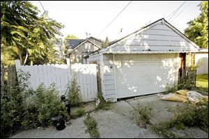 Suspected human remains were found in a computer box, stored in a detached garage at 704 Federal St. in East Toledo.