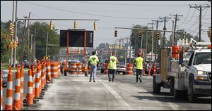 Orange barrels no long greet motorists along Secor Road now that the street's $5.4 million reconstruction is completed. 