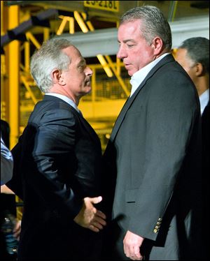 Sen. Bob Corker (R., Tenn.), left, shown with a UAW official in 2011, has urged Volkswagen to avoid dealing with the union at its Chattanooga factory.