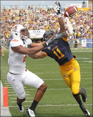 Bowling Green receiver Chris Gallon has second quarter a pass broken up in the end zone by Kent State's Darius Polk at Dix Stadium.