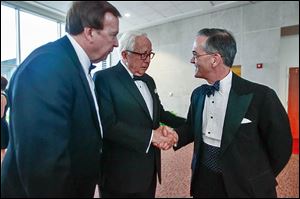 Pulitzer Prize-winning author David McCullough, center, speaks with Clyde Scoles, left, executive director at Toledo-Lucas County Public Library, and John Robinson Block, Blade publisher and editor-in-chief. Block Communications Inc., parent of company of The Blade, was a key sponsor of the event.