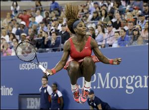 Serena Williams celebrates after beating Victoria Azarenka during the U.S. Open final Sunday in New York.