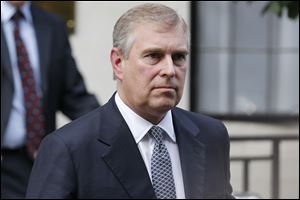 Two days after an intruder was discovered prowling around Buckingham Palace, police confronted Prince Andrew, the second son of Queen Elizabeth II, in the royal residence's garden and demanded he identify himself.