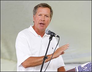 In his speech, Gov. John Kasich heralded the courage of those who fought and he paid tribute to the lives lost.