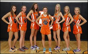 Liberty Center is looking to capture a third consecutive Division III state girls cross country championship with, from left, Emma Babcock, Cheryl Davenport,  Olivia Kundo, Brittany Atkinson, Paige Chamberlain, Sara Knapp, and Jenna Vollmar.