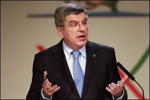Thomas Bach, of Germany, speaks after being named the new president of the International Olympic Committee during the 125th IOC session in Buenos Aires, Argentina.