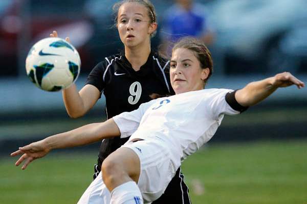 Anthony-Wayne-s-Abby-Allen-3-kicks-the-ball-against-Perrysburg-s-Erika-Joldrichsen-9