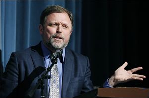 Anti-racist author, educator, and essayist Tim Wise speaks during the forum on racism Thursday at Woodward High School.  The event was sponsored by the Toledo Community Coalition and The Blade.