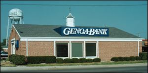 Genoa Banking Co. plans to open a branch in a former Sylvania Township firehouse now that the bank and ABC Warehouse have received a waiver on parking requirements.