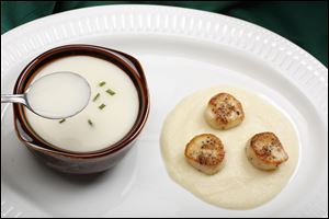Cauliflower soup, left, and seared scallops on pureed cauliflower.