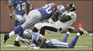 Earl Holmes forces a fumble during a game against the Baltimore Ravens on Oct. 9, 2005. Holmes was a fourth-round pick of the Pittsburgh Steelers in 1996 who also played one season with the Browns.