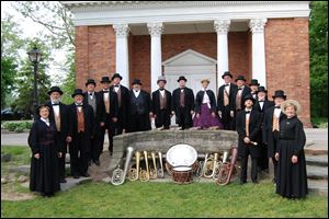 Members of the Dodworth Saxhorn Band perform on historic brass, woodwind, and percussion instruments from the 1840s to 1880s. They will appear in concert Sunday at Historic Woodlawn Cemetery.