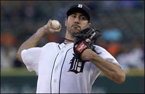 Detroit Tigers starting pitcher Justin Verlander throws against the Seattle Mariners in the first inning.