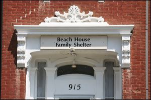 Beach House operates in a mansion built in 1867 on North Erie Street near downtown Toledo. The shelter has six bedrooms on the second floor and one bedroom for disabled residents on the first floor. It has three bathrooms for its residents. The shelter was started in 1921 to serve homeless women and children.