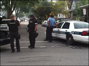 Toledo police prepare during the standoff. 