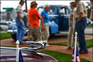 Several older models cars, including this 1941 61 Series Cadillac owned by George Stockman of Milan, Mich., were on display during the 12th annual Cadillac show at Taylor Cadillac in Sylvania Township. 