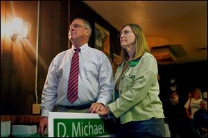 Sandy Drabik, watching election returns with her husband D. Michael Collins during the 2009 Toledo primary, also has attempted research into her husband’s family lore but said Ireland’s turbulent history has resulted in records gaps.