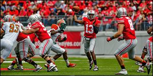 Kenny Guiton broke the Ohio State record held by John Borton and Bobby Hoying, who each threw five touchdown passes in a game.