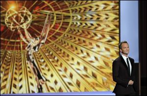 Host Neil Patrick Harris speaks on stage at the 65th Primetime Emmy Awards at Nokia Theatre  in Los Angeles. 