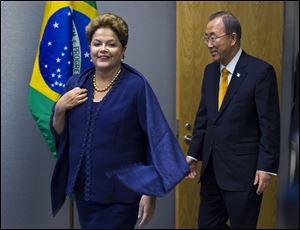 Dilma Rousseff, president of Brazil, arrives with United Nations Secretary-General Ban Ki-moon during the 68th session of the United Nations General Assembly at U.N. headquarters.