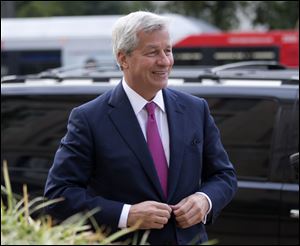 An $11 billion national settlement is under discussion to resolve claims over JPMorgan's handling of mortgage-backed securities in the run-up to the recession, said a government official familiar with ongoing negotiations among bank, federal and New York state officials.
