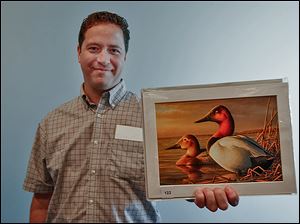 Adam Grimm of South Dakota, a native of Elyria, is the winner for this year’s Federal Duck Stamp Art Contest, with his oil painting of a pair of Canvasbacks.