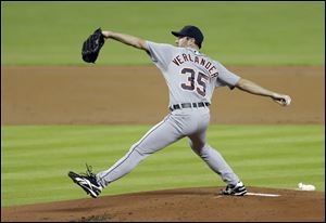 Detroit Tigers' Justin Verlander pitches to the Miami Marlins in the first inning. Tigers lost in ninth inning.