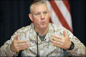 Brig. Gen. C. Mark Gurganus speaks to reporters at a news conference in Baghdad's heavily fortified Green Zone.