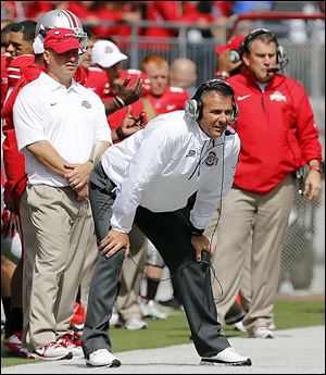 OSU coach Urban Meyer will visit Northwestern for the first time in nearly 12 years Saturday night. While at BGSU, his Falcons used a fourth-quarter rally to win 43-42 in November, 2001.