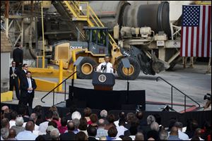 President Obama speaks about the government shutdown and debt ceiling during a visit to M. Luis Construction, which specializes in asphalt manufacturing, concrete paving, and roadway reconstruction in Rockville, Md. 